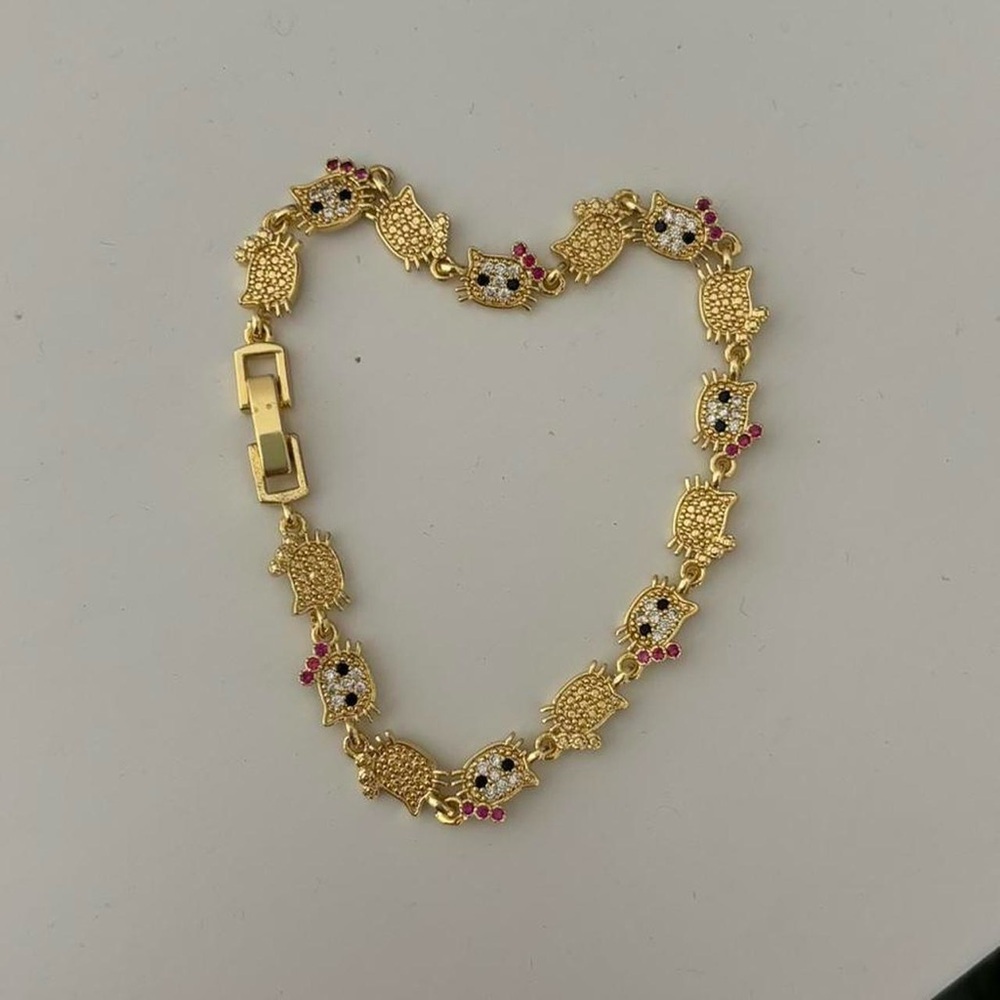 Hello Kitty Gold bracelet with rhinestones and pink bow